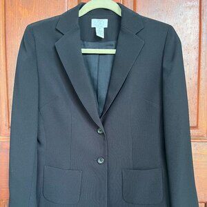 Black suit jacket, quality wool crepe fabric. Timeless.